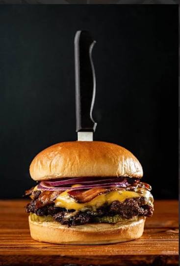 Berger Bros. burger with bacon, cheese and a knife through the bun